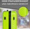 Close-up of a lime green suitcase with black accents. Produktbild-Vorschau