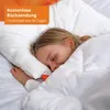 A young girl sleeping peacefully on a pillow, covered by a white duvet. Anteprima dell’immagine prodotto