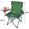 A green camping chair with dimensions indicated by measurement lines and text. Voir les images du produit