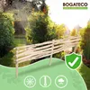 A wooden garden fence is shown in a garden setting with rain falling. Náhled obrázku produktu