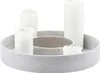 A concrete candle holder with three white pillar candles on a white background. Voir les images du produit