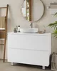 A modern bathroom vanity with a vessel sink and faucet. Voir les images du produit