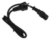 A black power cord with two different types of plugs on each end, lying on a white background. Náhled obrázku produktu