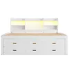 A white bed frame with built-in shelving and drawers, illuminated by LED lights. Produktbild-Vorschau