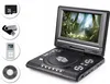 A portable DVD player is shown open, displaying a movie on its screen. To the left, there are circular insets showing a memory card, a USB drive, an MP3 player, and a DVD disc. Anteprima dell’immagine prodotto