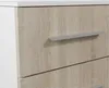A close-up view of a wooden dresser with two drawers and handles. Náhled obrázku produktu