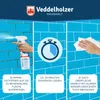 An instructional graphic showing three steps for using a mold remover spray on a tiled wall. Produktbild-Vorschau