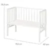 A white wooden crib with dimensions indicated by dashed lines and text labels. Produktbild-Vorschau