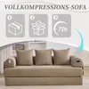 A khaki-colored sofa with three cushions is shown in a room. Above the sofa, there are three graphic icons illustrating a shipping box, an opened shipping box with a checkmark, and a clock showing 72 hours. The text 'VOLLKOMPRESSIONS-SOFA' is at the top. Produktbild-Vorschau