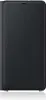 A black book-style phone case is shown standing upright on a reflective white surface. Produktbild-Vorschau