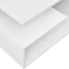 A close-up view of a white, modern coffee table with layered shelves, presented against a plain white background. Voir les images du produit
