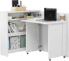 A white folding desk with a laptop and a coffee cup on it, placed next to a bookshelf filled with books and office supplies. Produktbild-Vorschau