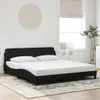A bedroom scene with a black bed frame and white bedding. Produktbild-Vorschau