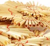A close-up view of straw stars, likely Christmas tree ornaments, arranged in a circular pattern. Produktbild-Vorschau