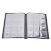 An open coin album with empty plastic sleeves on a white background. Podgląd zdjęcia produktu
