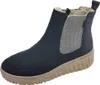 A single blue Chelsea boot with a tan sole and a herringbone pattern on the side. Voir les images du produit