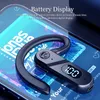 A close-up of a black Bluetooth headset resting on a smartphone screen displaying music information. Produktbild-Vorschau