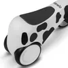 A close-up view of the front of a white balance bike with black cow-like spots and black wheels. Náhled obrázku produktu