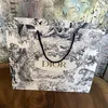 Torba Dior biała Toile de Jouy tygrysy i las złote logo Podgląd zdjęcia produktu 4