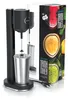 A black drink mixer with a stainless steel cup sits next to its packaging, which displays images of colorful drinks and fruits. Náhľad obrázku produktu