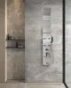 A modern bathroom with a stainless steel shower panel and hexagonal tiles. Podgląd zdjęcia produktu