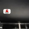 A close-up of a black grill with a logo that says "HeatWave by 4iQ". Podgląd zdjęcia produktu