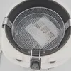 A top-down view of the inside of a deep fryer, showing the wire basket with some paper inside. Produktbild-Vorschau