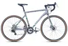 A studio shot of a gray WYNN gravel bike with tan tires, set against a white background. Produktbild-Vorschau
