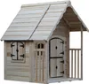 A wooden playhouse with a pitched roof, a window with shutters, a small door, and a porch with a railing. Anteprima dell’immagine prodotto