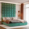 A teal upholstered bed with a large teal tufted headboard in a bedroom setting. Anteprima dell’immagine prodotto