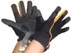 Hands wearing black and orange gardening gloves. Anteprima dell’immagine prodotto