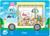 A cartoon-style image of a blue elephant character driving a food truck, with a scene inside the truck showing Cinnamoroll sitting on a couch with tea and pastries. Produktbild-Vorschau