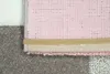 Close-up view of the corner of a rug, showing the different layers of its construction. Podgląd zdjęcia produktu