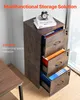 A filing cabinet with three drawers, some of which are open, showing files inside. Books and a clock are on top of the cabinet. Anteprima dell’immagine prodotto