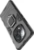 A close-up, angled view of a black smartphone case with a ring holder and a camera lens cutout. Náhled obrázku produktu