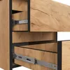 Close-up view of the wooden drawers and metal drawer slides of a piece of furniture. Produktbild-Vorschau