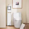 A bathroom scene with a toilet and a narrow storage cabinet. Náhľad obrázku produktu
