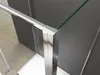 Close-up view of a shower enclosure corner, showing the metal frame and glass panel. Produktbild-Vorschau