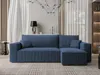 A blue sectional sofa is shown in a well-lit living room with curtains and a chandelier. Produktbild-Vorschau