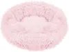 A fluffy, round, pink pet bed is shown from a top-down perspective against a white background.