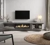 A modern living room with a wall-mounted TV cabinet featuring a fireplace and a television. Produktbild-Vorschau