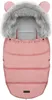 A pink baby sleeping bag with a grey faux fur hood and bear ears. Produktbild-Vorschau
