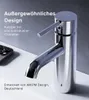 A chrome faucet is shown on a white surface with a gray background. Text overlays describe the product's design and origin. Produktbild-Vorschau
