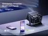 A projector and two smartphones are displayed on a surface, with text and logos indicating streaming capabilities. Produktbild-Vorschau