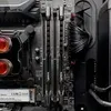 A close-up view of computer RAM modules installed on a motherboard. Produktbild-Vorschau