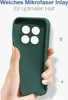 A hand holding a dark green phone case, showing the interior with four circular cutouts. Produktbild-Vorschau