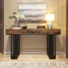 A console table with decorative items and a lamp in a hallway. Náhľad obrázku produktu