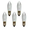 Five clear, ribbed candle-shaped light bulbs with gold bases are arranged in a scattered formation on a white background. Produktbild-Vorschau