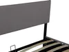 A close-up view of a bed frame's headboard and slats. Produktbild-Vorschau