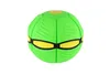 A green and yellow flat ball toy on a white background. Anteprima dell’immagine prodotto